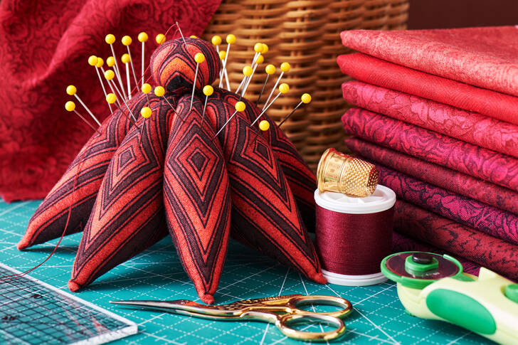 Red patches and sewing supplies