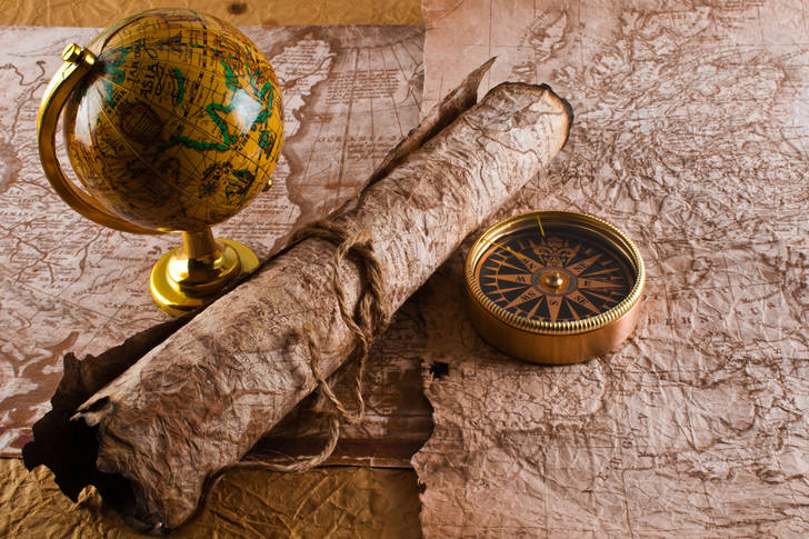 Vintage maps, globe and compass
