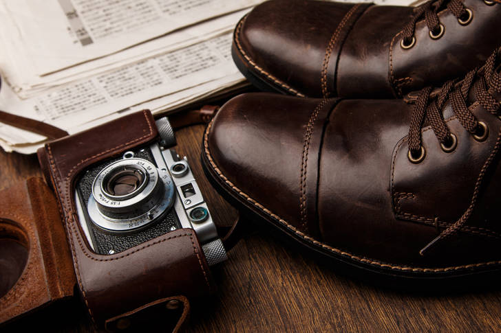 Leather boots and camera