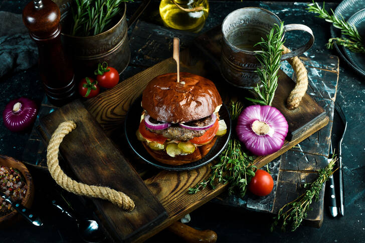 Burger on a wooden tray