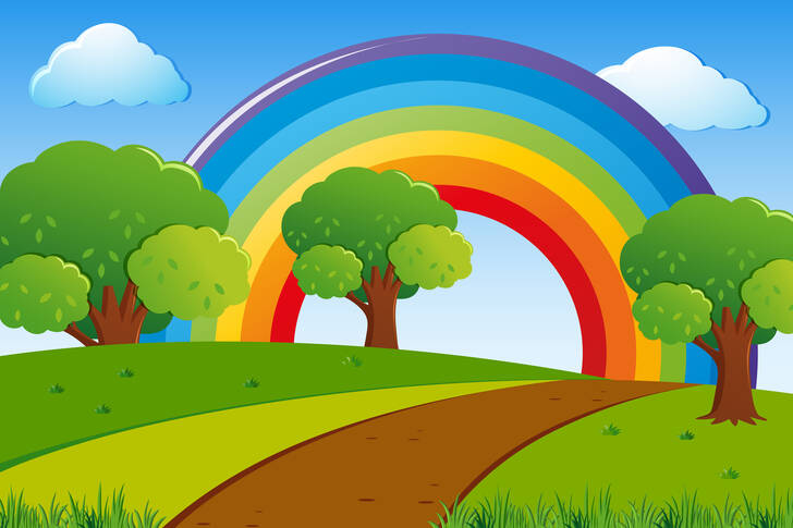 A rainbow over a green meadow