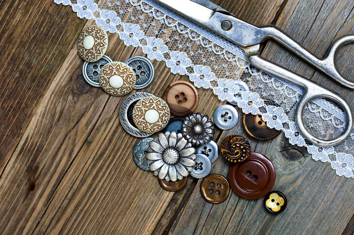 Buttons, lace and scissors