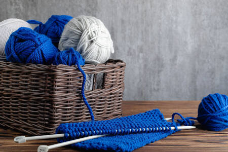 Balls of blue and white yarn