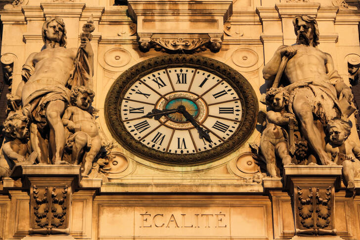 The clock on the facade of Paris City Hall