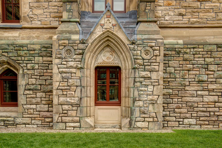 The building's facades are in the Gothic style