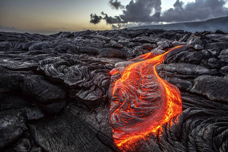 Molten lava near a volcano