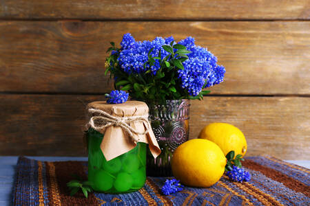 Lemons and flowers on the table
