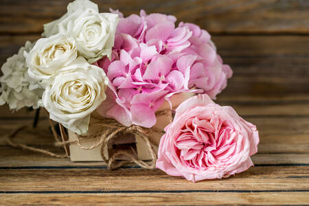A bouquet of roses and hydrangeas