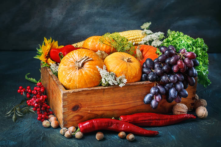 Vegetables and fruits in a wooden box