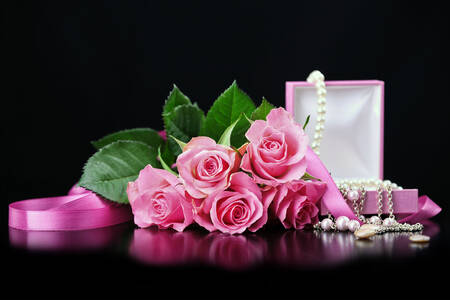 Pearl necklace and roses