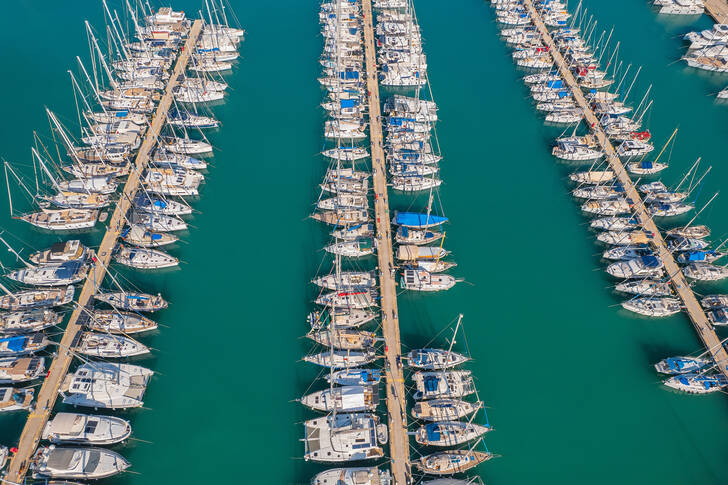 White yachts on the pier