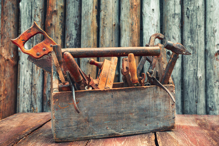 Wooden box with old tools