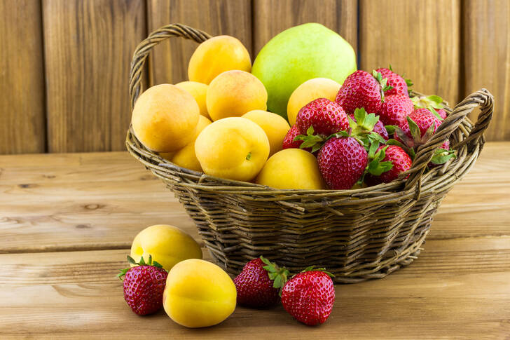 Apricots and strawberries in the basket