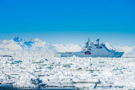 An icebreaker in an icy harbor
