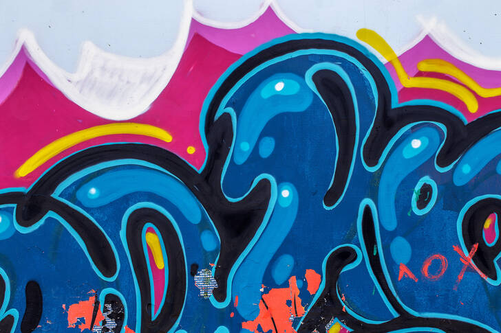 A fragment of colorful street graffiti