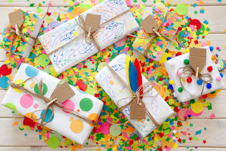 Gifts on colorful confetti
