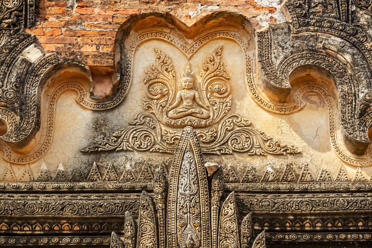 Carved bas-relief on the temple in Bagan