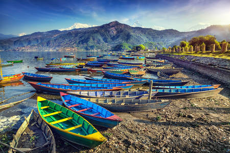 Boats on the shores of Lake Pheva
