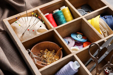 Sewing supplies in a box