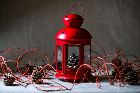 Red lantern with pine cones