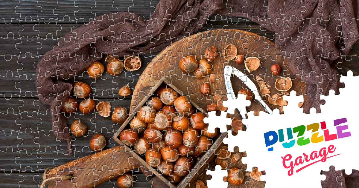 Hazelnuts on a wooden board Jigsaw Puzzle (Home, Food) Puzzle Garage