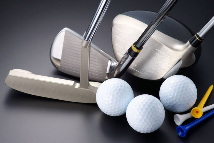 Golf balls and clubs