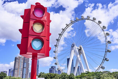 Ferris wheel and traffic light with hearts