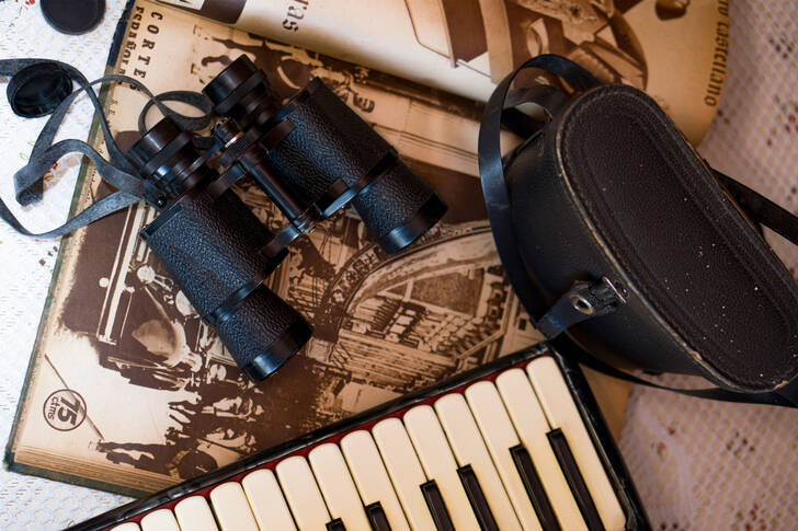 Retro binoculars on an old book