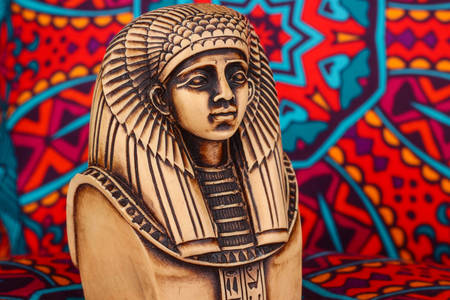 Pharaoh statue on colorful background
