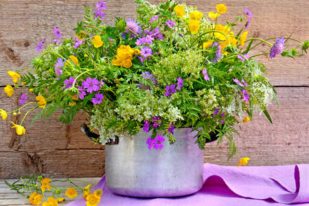 Bouquet of wild flowers in a pot