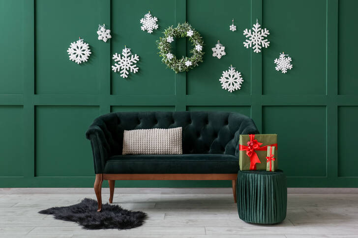 Festive interior of a green living room