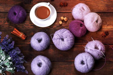 Balls of woolen threads on the table
