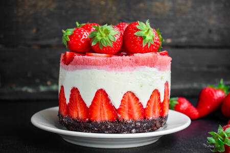 Cake with strawberries and biscuit