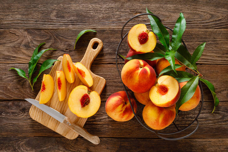 Peaches on a wooden table
