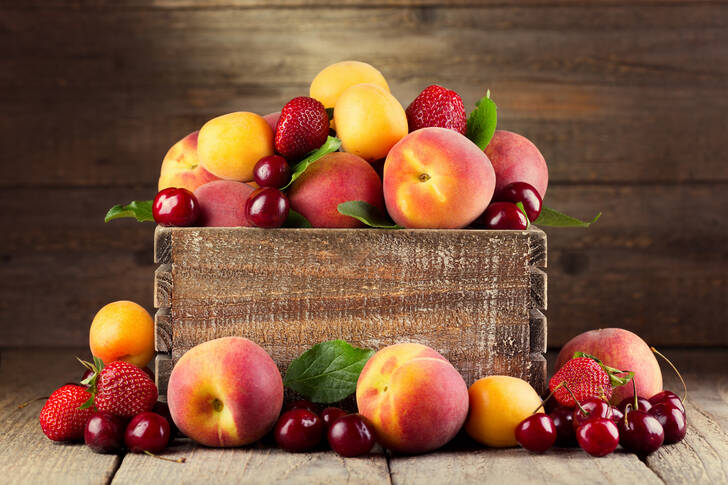 Berries and fruits in a box