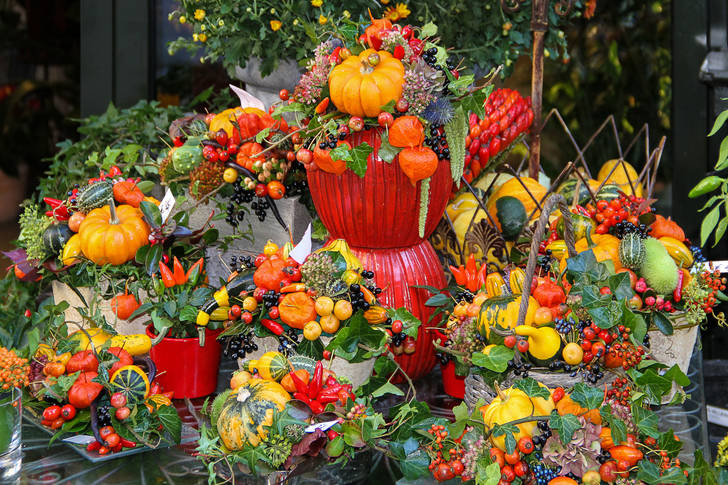 Autumn street composition with pumpkins